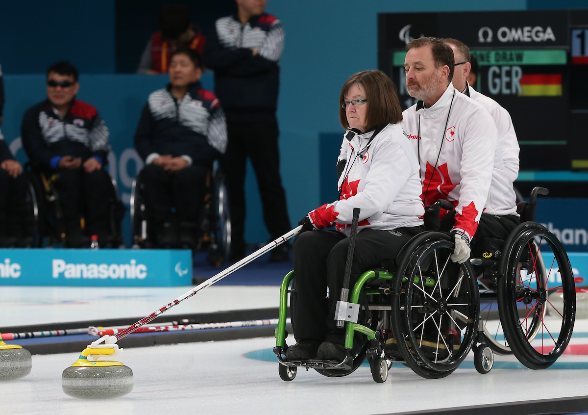 Marie Wright preparing to take a shot in wheelchair curling at the PyeongChang 2018 Paralympic Winter Games