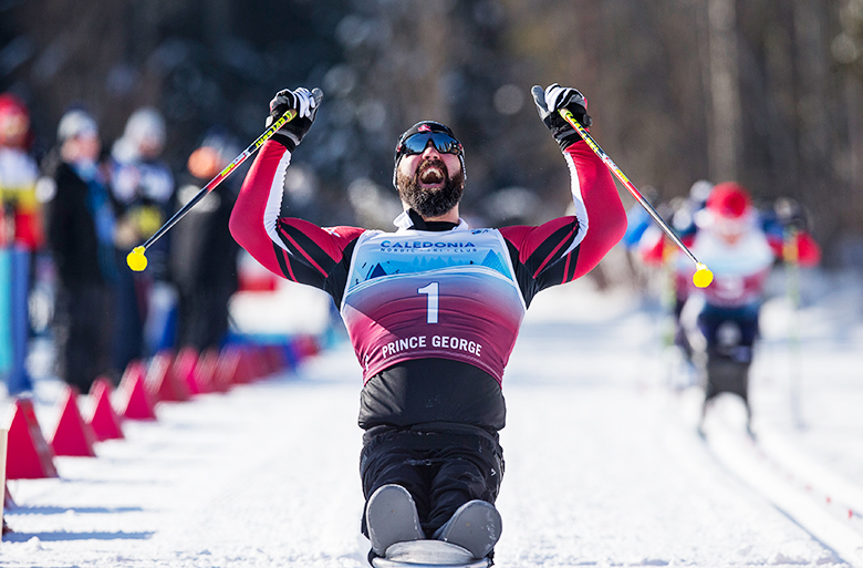 Collin Cameron, para nordic skiing crossing the finish line