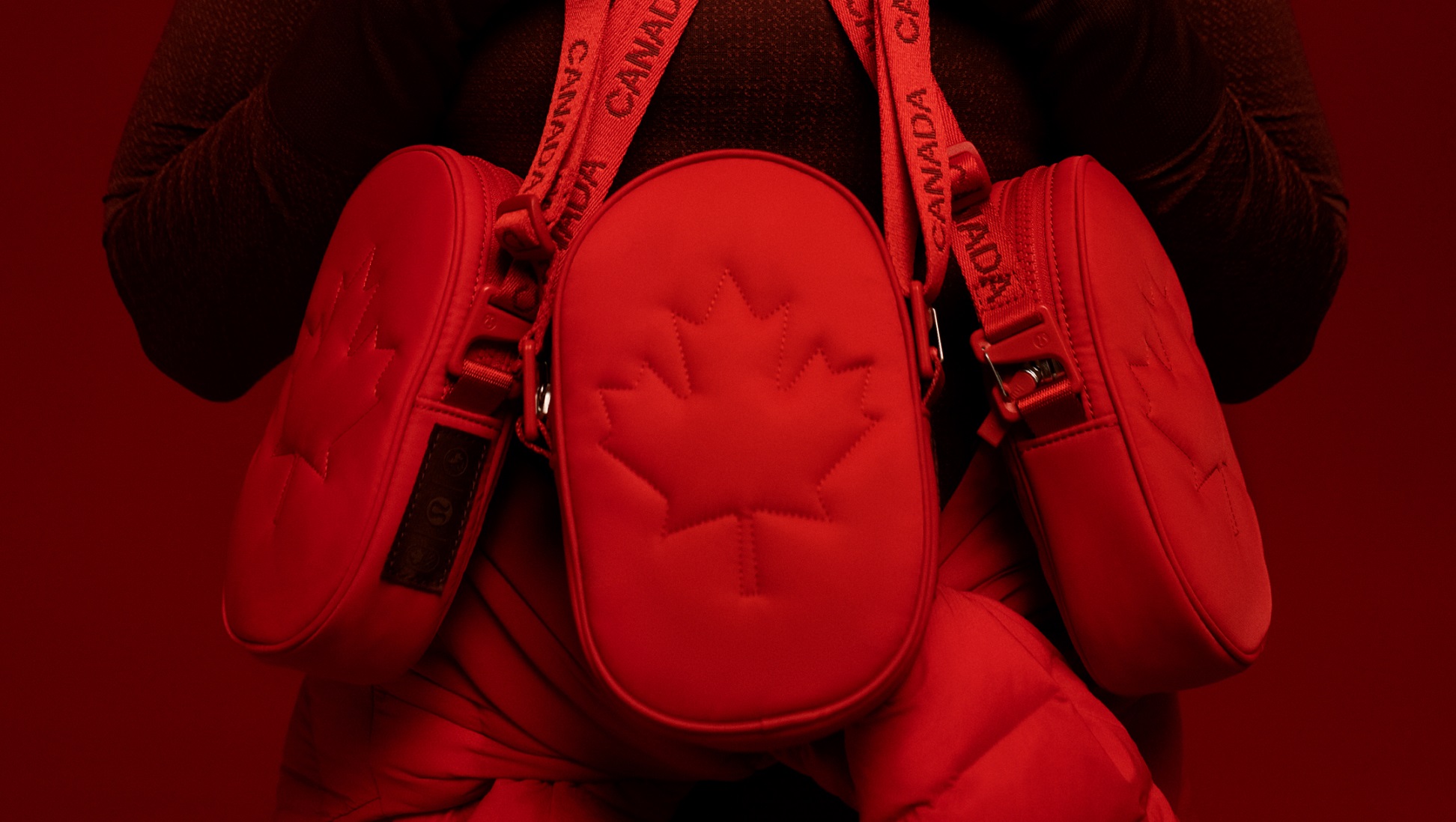 A image showing three red lululemon Team Canada Future Legacy bags