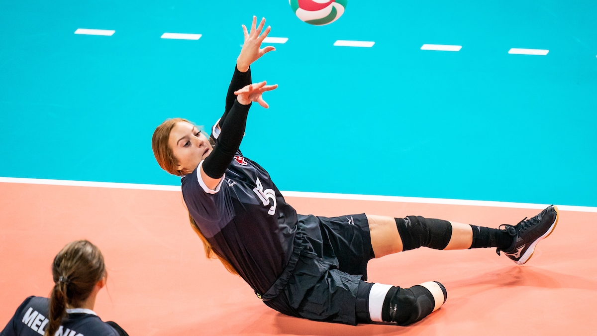 Payden Olsen volleys the ball in sitting volleyball action at the Lima 2019 Parapan Am Games