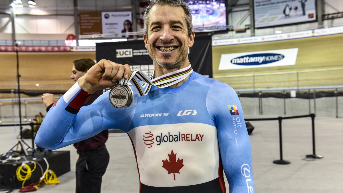 Tristen Chernove smiles holding up his two silver medals won on day three at the Para Cycling Track World Championships. 