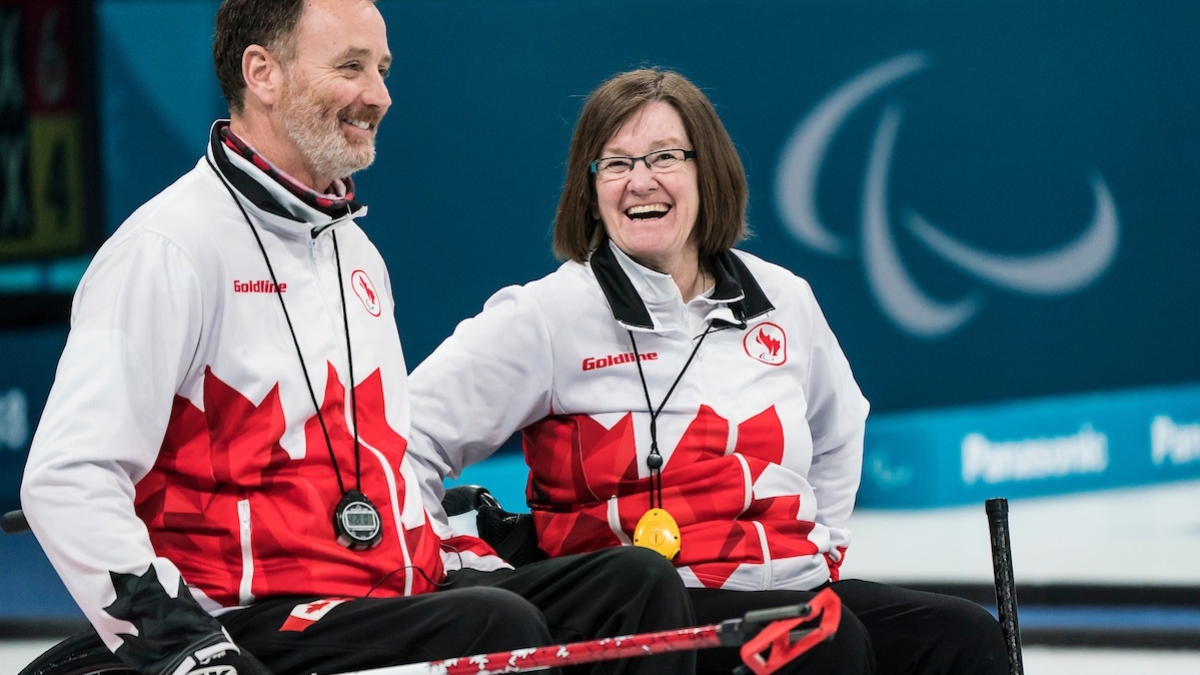 Jamie Anseeuw and Marie Wright sharing a laugh during wheelchair curling action at the PyeongChang 2018 Paralympic Winter Games.