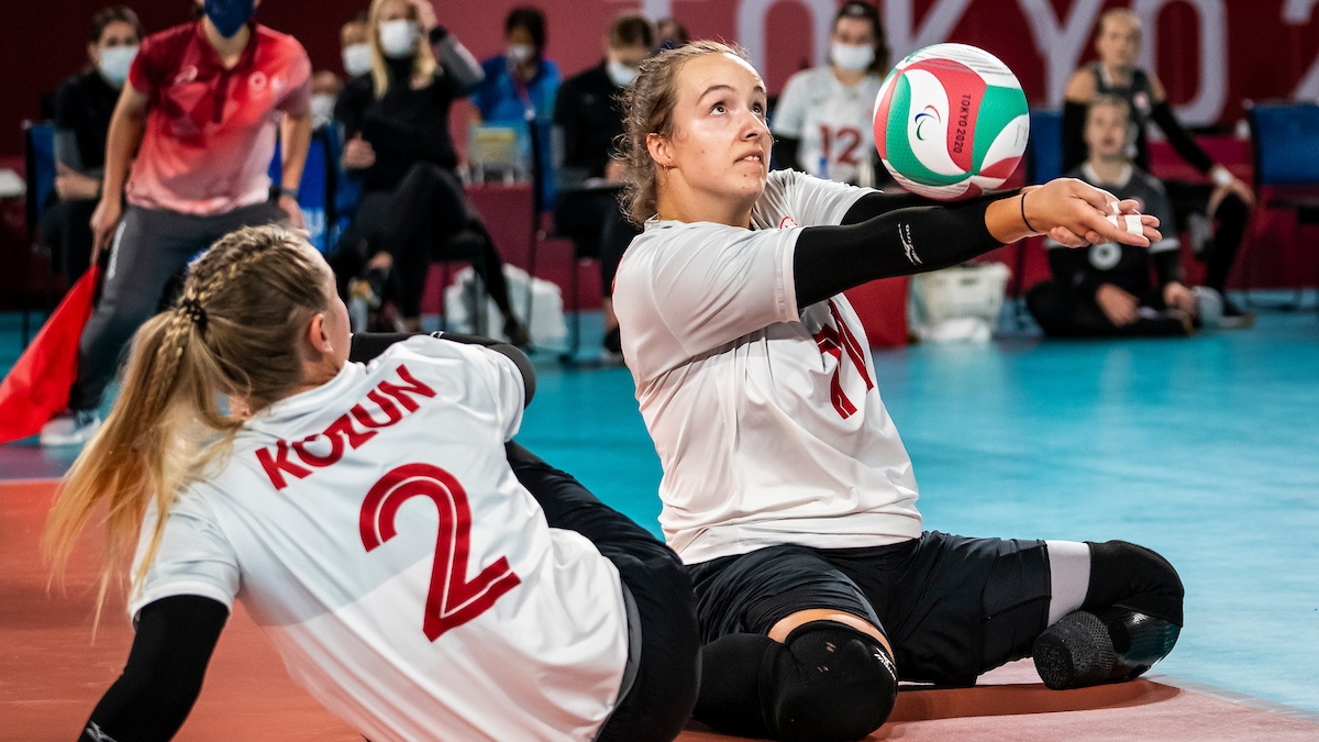 Heidi Peters playing sitting volleyball