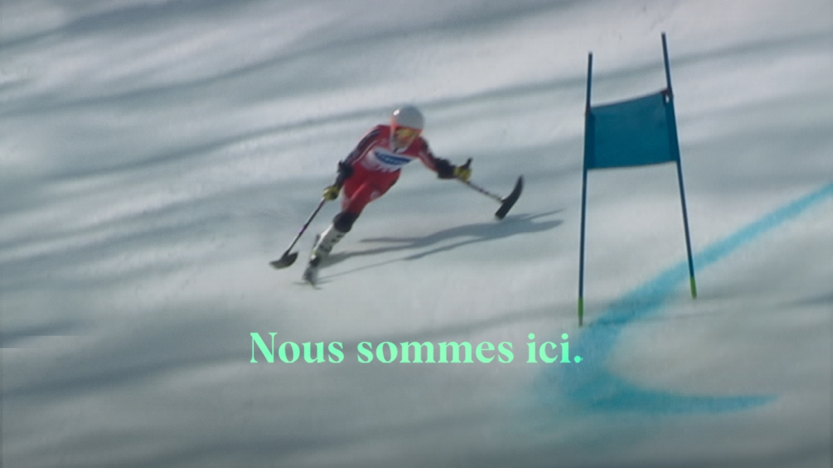 Nous Sommes ici text overlaid on an image of rederique Turgeon skiing