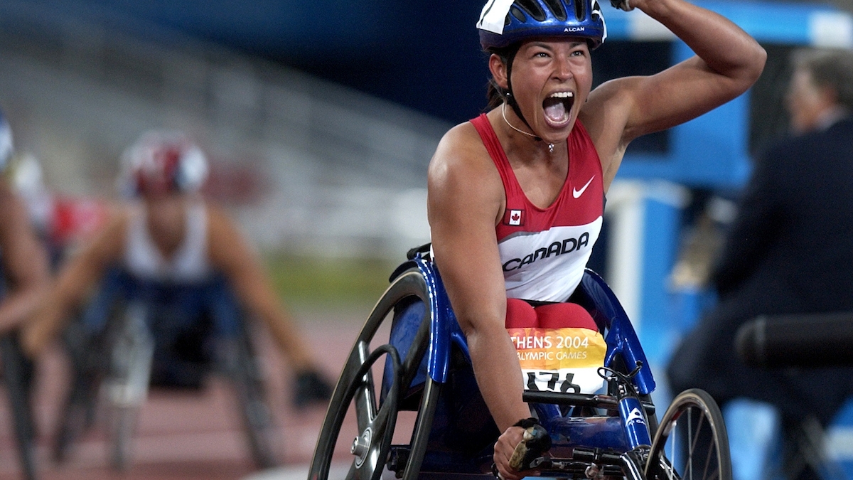 Chantal Petitclerc celebrates at the Athens 2004 Paralympic Games. 