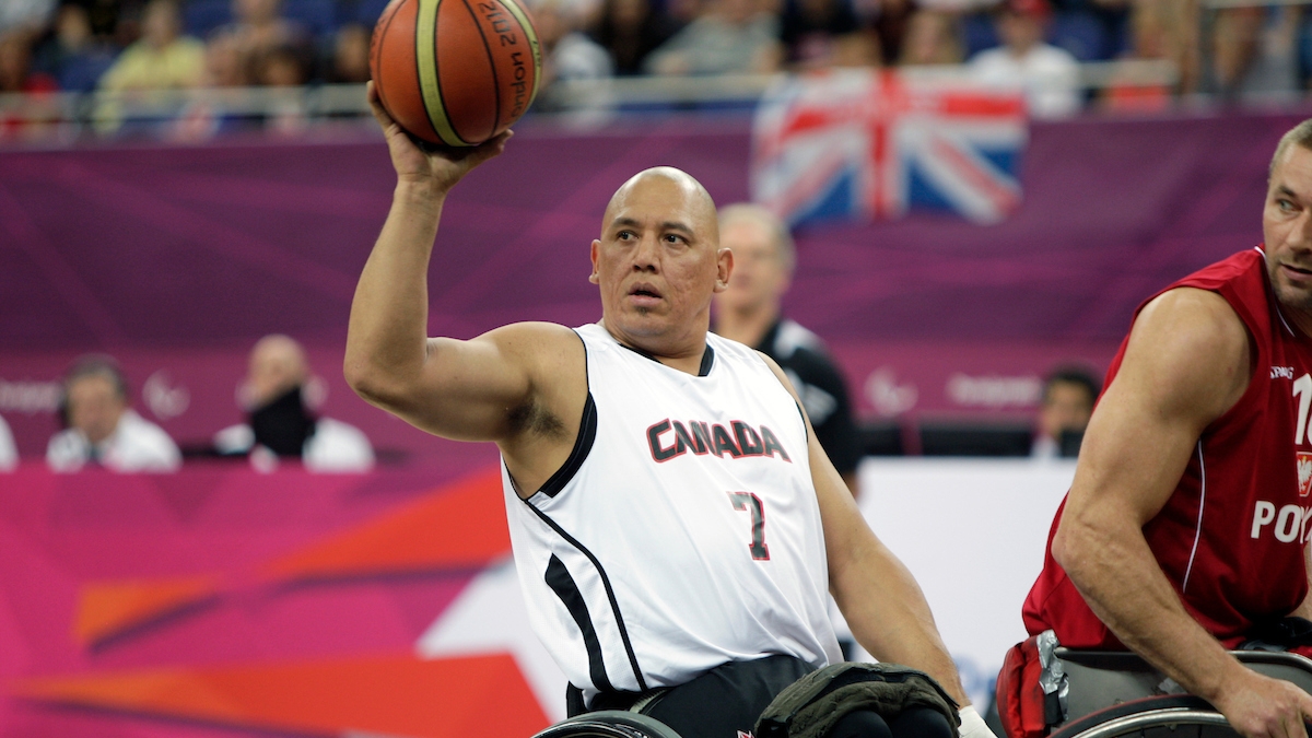 Richard Peter throwing a basketball in competition at the London 2012 Paralympic Games