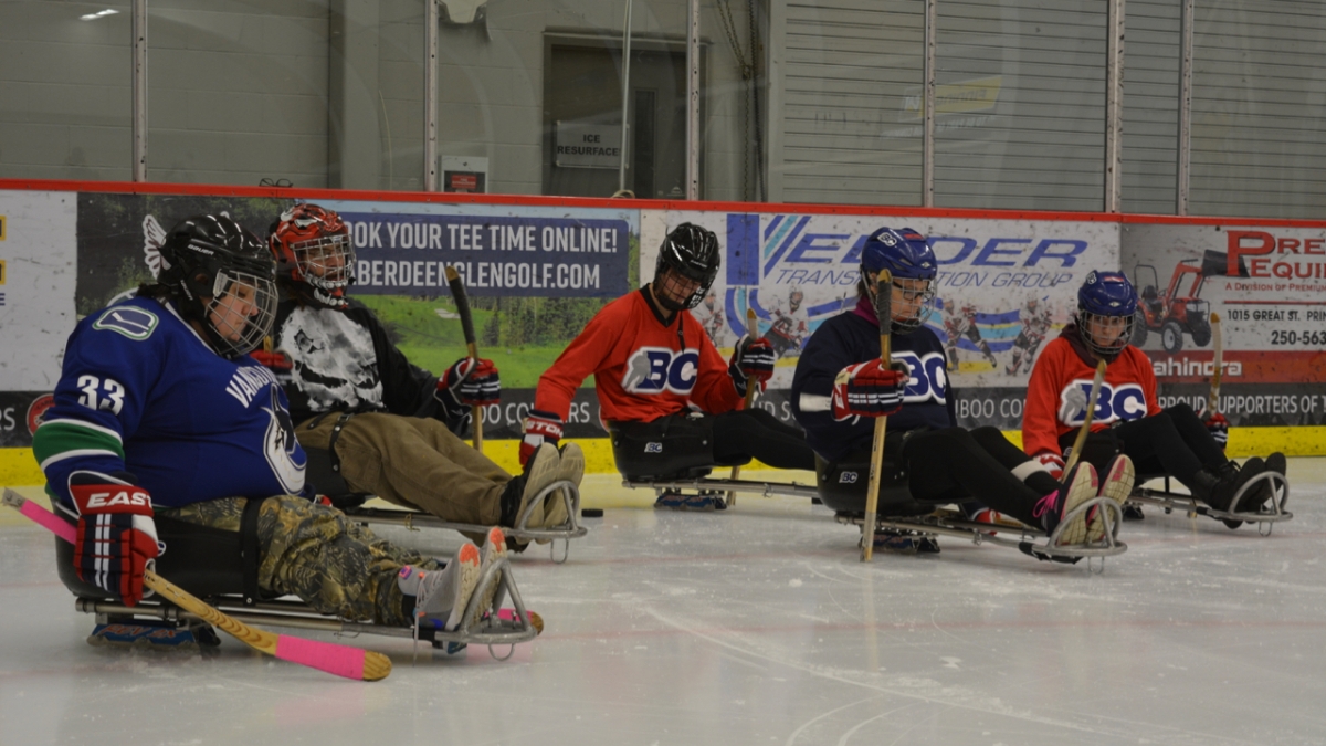 Northern Adapted Sports Association participants at a Para ice hockey session. 