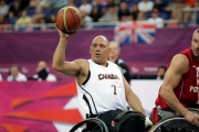 Richard playing wheelchair basketball