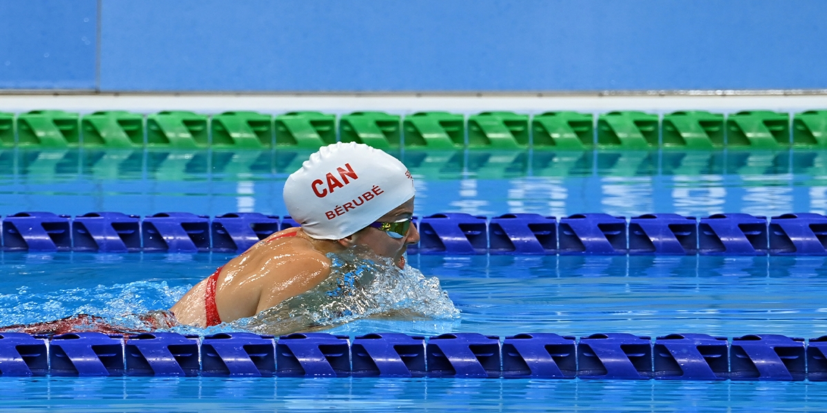 Camille Berube swimming