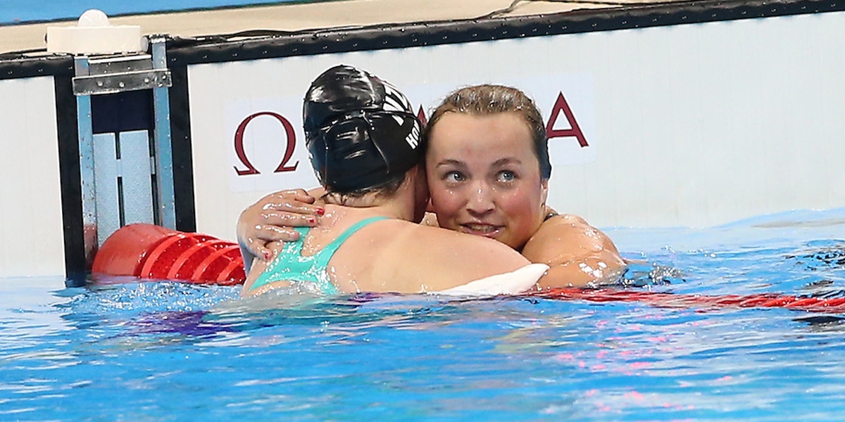 Tess Routliffe hugging a fellow competitor following their swimming race at the Rio 2016 Summer Paralympics.
