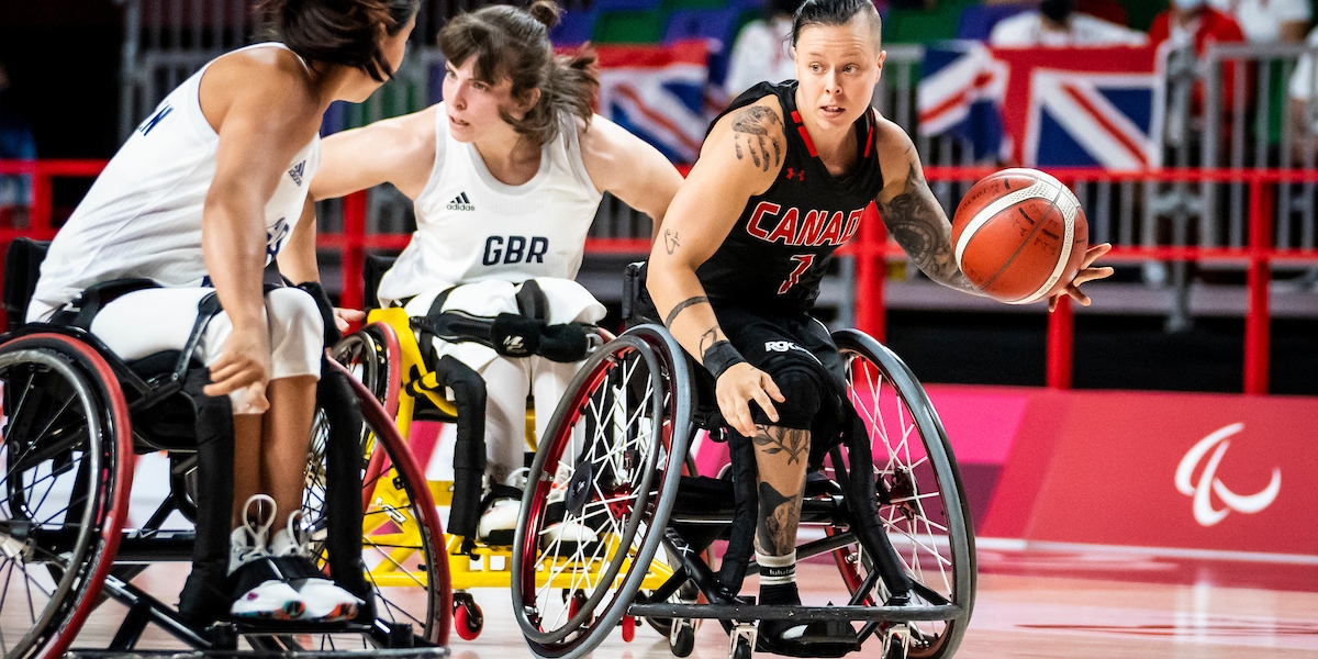 Cindy Ouellet playing wheelchair basketball