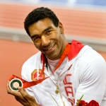Dean Bergeron poses with his gold medal from the Beijing 2008 Paralympics.