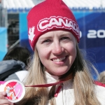 Lauren Woolstencroft showing her gold medal in Turin