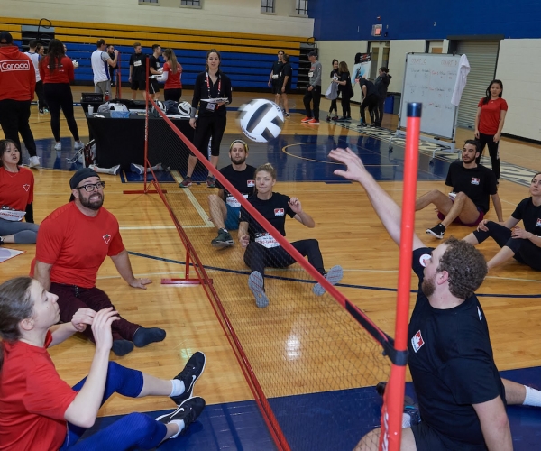 Participants at ParaTough Cup in Toronto in 2020 compete in sitting volleyball