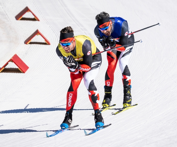 Brian McKeever and guide Russell Kennedy race in cross country at the Beijing 2022 Paralympic Winter Games