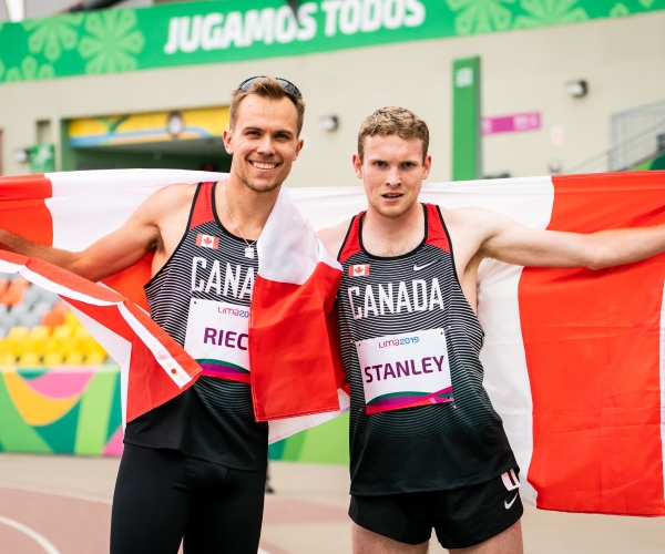 Nate Riech and Liam Stanley with the Canadian flag. 