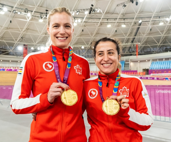 Carla Shibley (right) and her pilot Meghan Lemiski (left) with their gold medals. 
