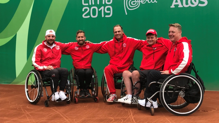 Coach Kai Schrameyer (centre) flanked by the Lima 2019 Canadian wheelchair tennis team: left to right, Mitch McIntyre, Rob Shaw, Thomas Venos, and Jonathan Tremblay