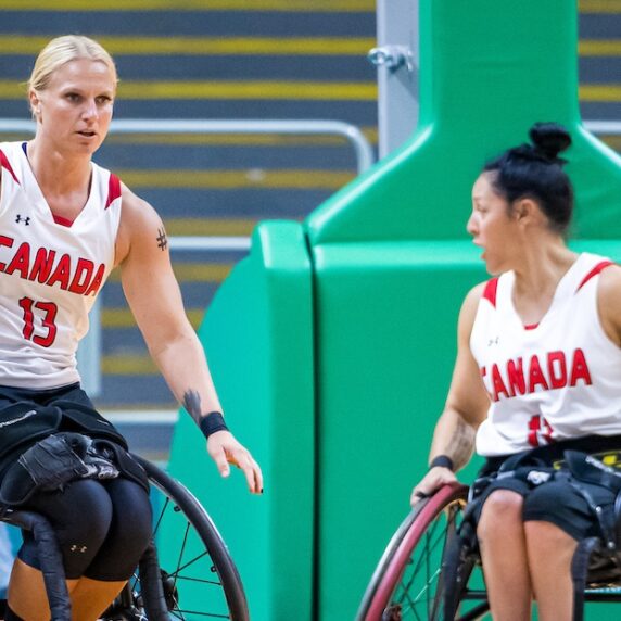 Kady Dandeneau and Tara Llanes in wheelchair basketball action at Santiago 2023