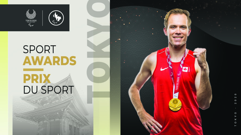 Nate Riech fist pumping with his gold medal