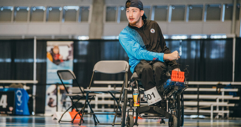 Marc-Antoine Goupil during a Boccia match. | Marc-Antoine Goupil lors d'un match de boccia.