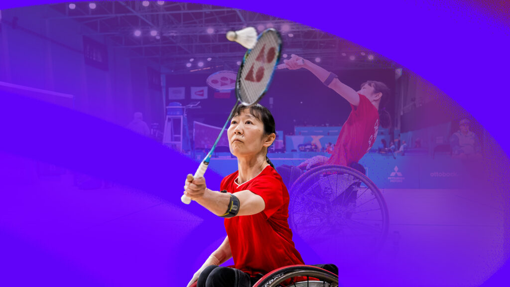 Yuka Chokyu holds a badminton racket, hitting a birdy. She's on a purple and blue background.