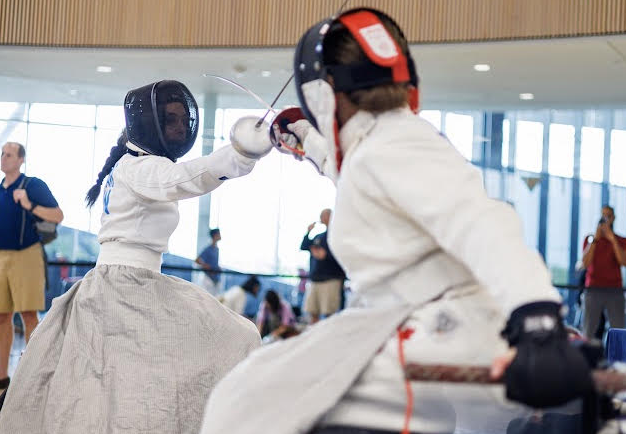 Two people para fencing