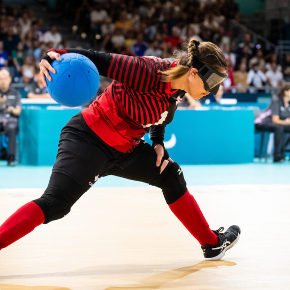 Canadian Goalball player prepares to shoot ball