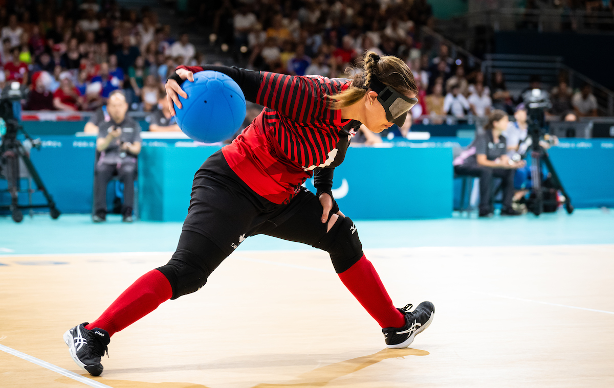 Canadian Goalball player prepares to shoot ball