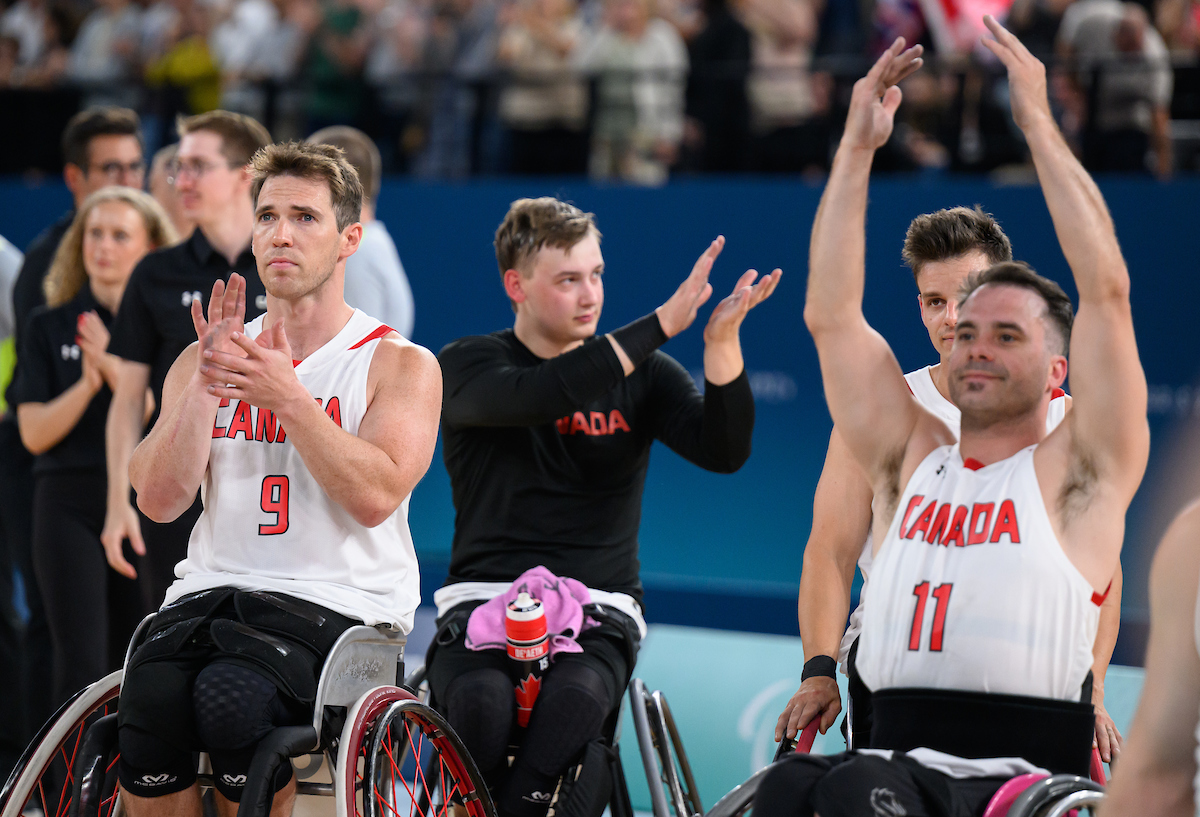 Colin Higgins et Chad Jassman après leur match contre la Grande-Bretagne.